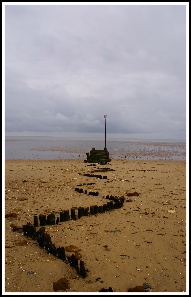 A centred snake like breaker heading out into the sea