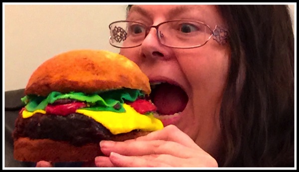 Sally about to eat her Cheese Burger Cake that Sarah made for her!