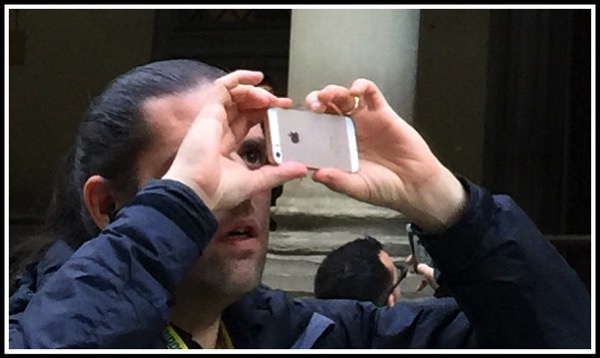 Me taking photo with iPhone