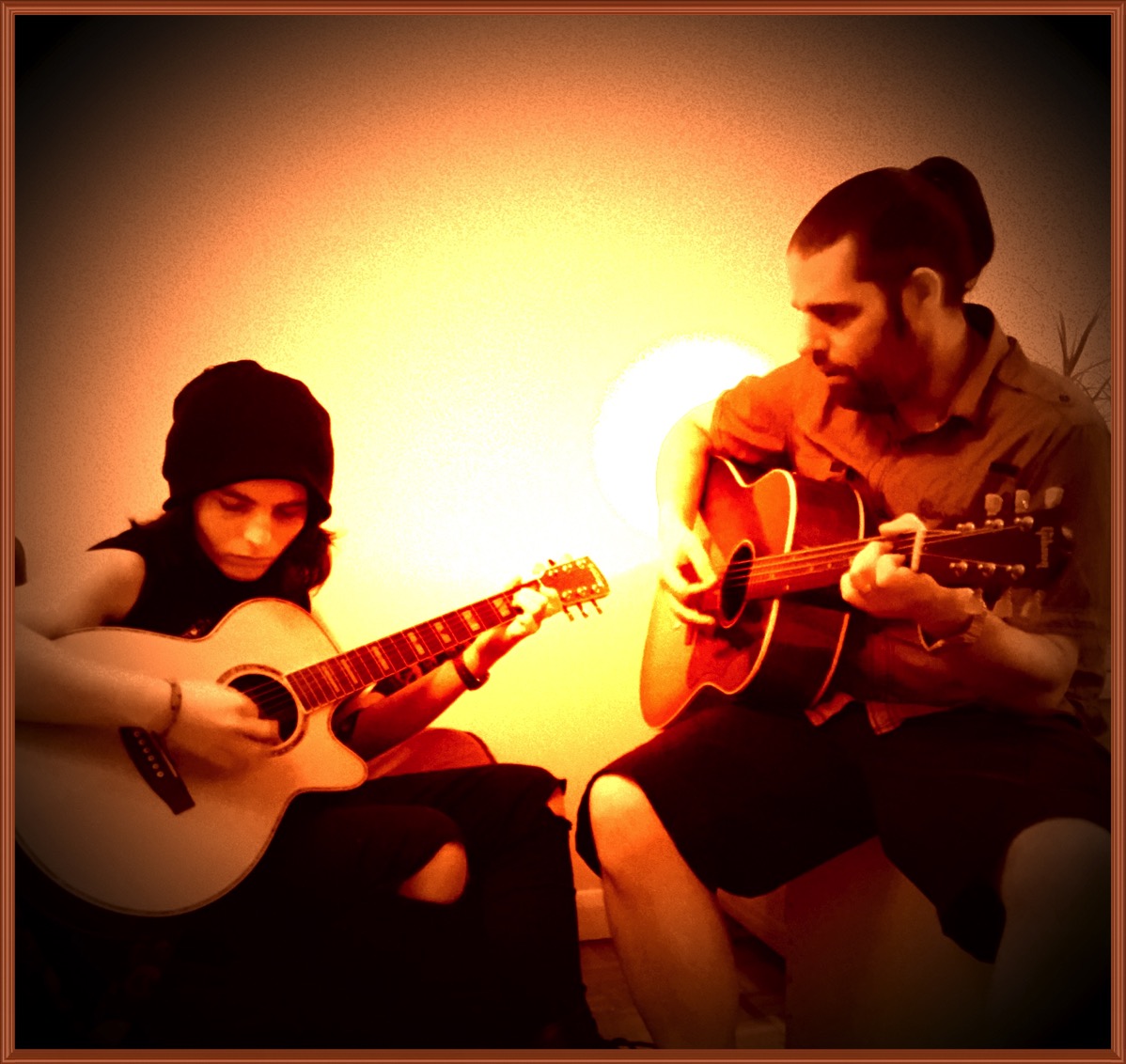 Me(on the right) playing guitar with my brother in law(on the left)